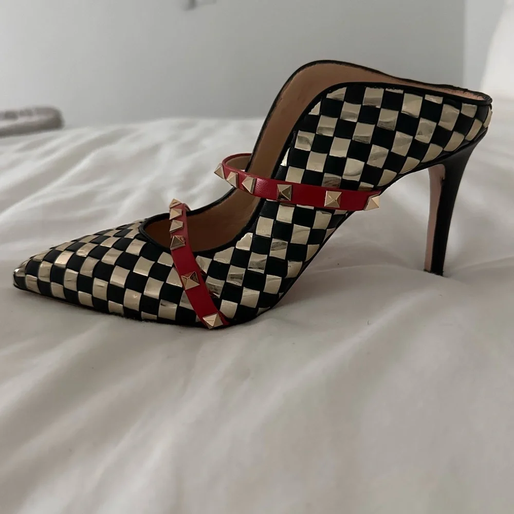 Elegant Black and Gold Checkered Heels with Red Accents
